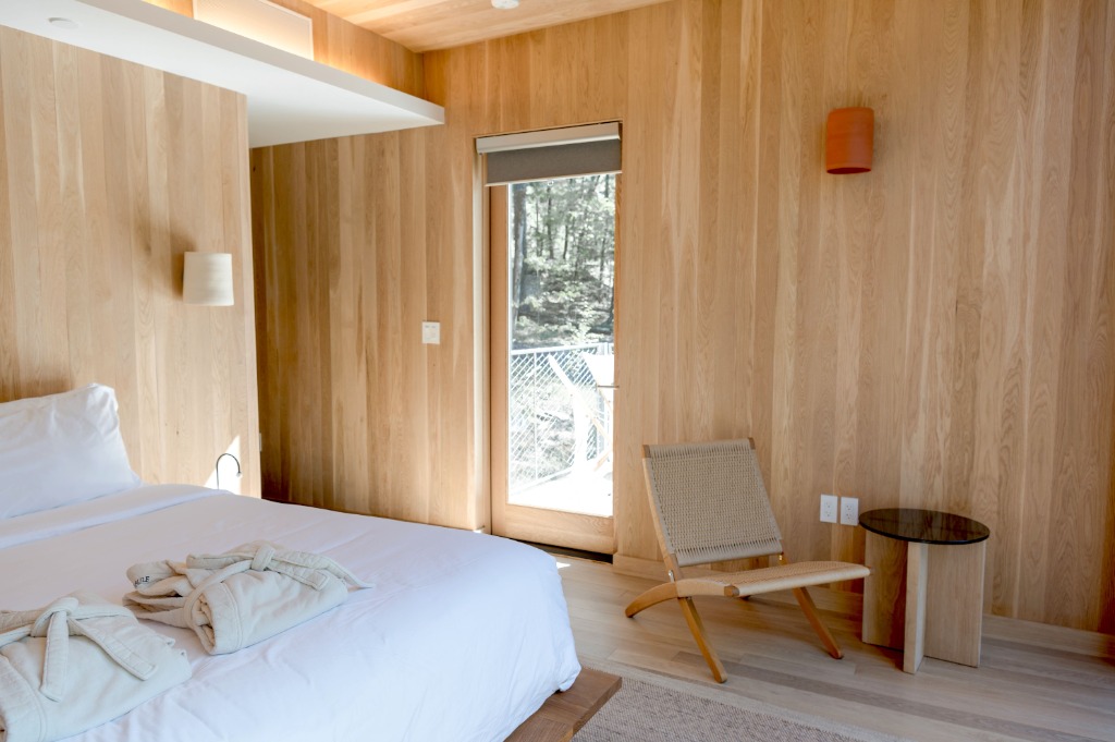 Modern wood-paneled bedroom interior